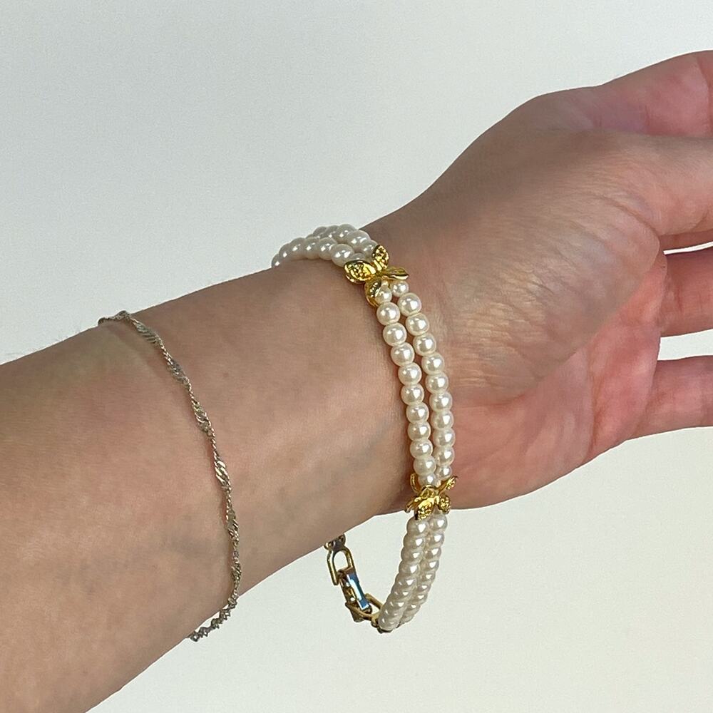 Double Strand White and Gold Tone Beaded Bracelet. - Picture 1 of 6